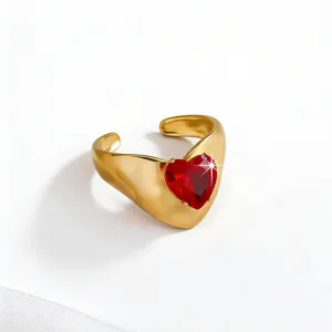 Gold-plated stainless steel open ring detail with sparkling red heart cubic zirconia.
