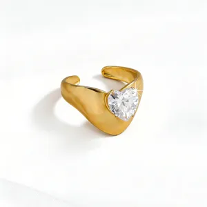Gold-plated stainless steel ring featuring a sparkling heart-shaped zircon crystal.