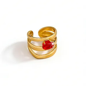 Gold plated multi layer stainless steel ring with vibrant red zircon stone elegant open design
