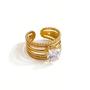 Close-up detail of gold-plated stainless steel stackable ring with a sparkling heart CZ.
