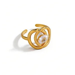 Stainless steel gold plated cubic zirconia open ring with twisted design for women fashion jewelry.
