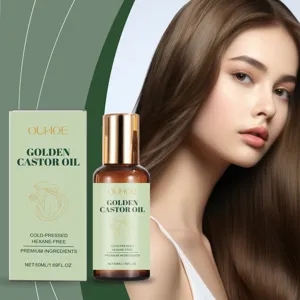 Vue détaillée du flacon d'huile de ricin dorée OUHOE et de sa boîte pour les cheveux et la peau.