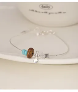 Detailansicht s925 Silberarmband mit Adlerholz und Türkisperlen