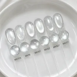 Detail showing clear glass bead cat's eye nail gel swatches with magnetic effect.