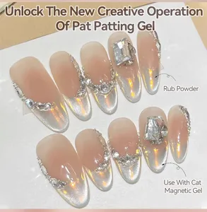 Detailed view of cat eye gradient nail art effect created with patting gel and rhinestones