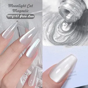 Macro detail of pearly white magnetic cat eye nail gel with shimmery finish