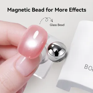 High-power magnetic bead tool for creating wide cat-eye nail art effects on pink polish