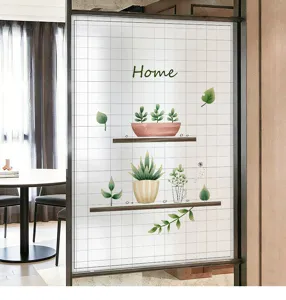 Frosted glass privacy film detail showing green potted plants and Home text design