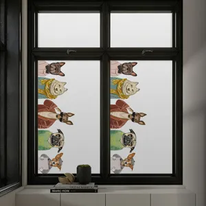 Detalle de lámina de privacidad esmerilada para ventanas con diseño de perros lindos.
