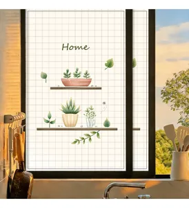 Frosted privacy window film featuring green potted plant designs in a cozy kitchen setting