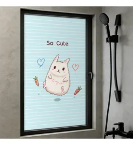 Detailed view of cute cartoon rabbit privacy glass film applied to bathroom window