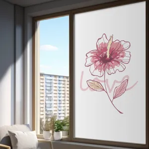 Frosted privacy glass window film with a decorative pink hibiscus flower design