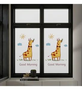 Detailed view of frosted window film with cute cartoon giraffe and sun pattern