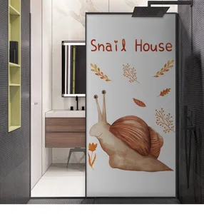 Macro view of frosted privacy glass film featuring a cute brown snail and leaves