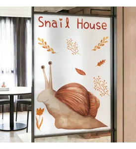 Macro detail view of brown snail cartoon pattern on frosted static window privacy film