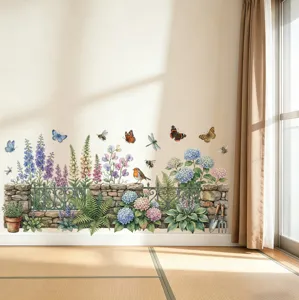 Vinilos decorativos de jardín en acuarela con mariposas y pájaros en pared de salón.