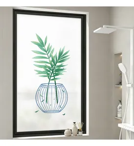 Modern frosted window privacy film featuring green bamboo leaf design in a bathroom