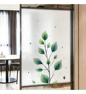 Macro detail showing the green leaf pattern on a frosted privacy glass window film