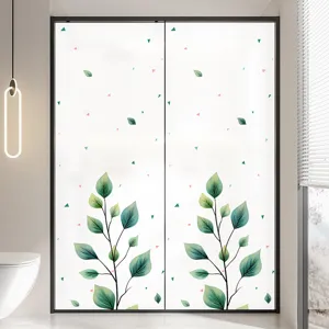 Minimalist frosted glass window film featuring a green leaf pattern for privacy.