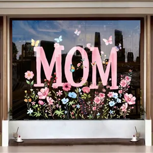 Detailed view of floral Mother's Day static window stickers with large pink MOM text