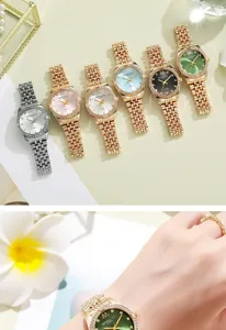 Detailed macro view of a stylish green dial rhinestone watch worn on a woman's wrist