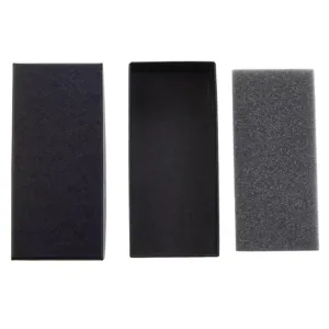 Close-up detail of a minimalist rectangular black watch gift box with foam insert
