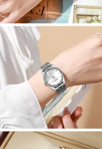 Detailed on-wrist view of a silver women's watch with a rhinestone-studded bezel.