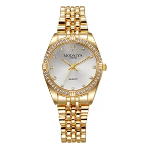 Elegant gold women's quartz watch with rhinestone bezel and luxury five-link bracelet