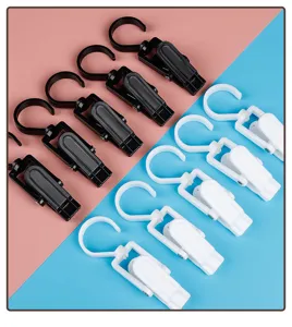 Detailed view of plastic rotating multi-functional clothing and hat clips with rotatable hooks.