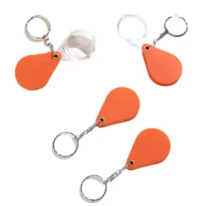 Portable folding magnifying glass keychain with clear lens, ideal for seniors and kids daily use.