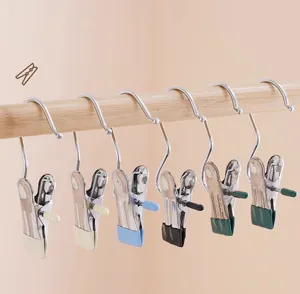Pinces à linge en acier inoxydable avec crochets en S, cintres antidérapants pour rangement maison.