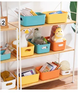 Plastic desktop storage box for snacks, cosmetics, and sundries. Multi-color home organizer bin.