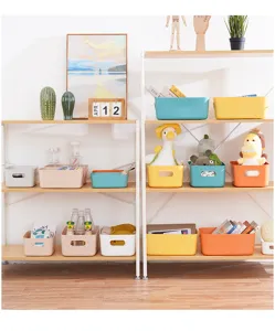 Plastic desktop storage box with handle, multi-color organizer basket for home office kitchen.