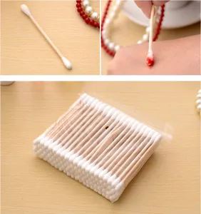 Disposable wooden cotton swabs with dual soft tips for makeup removal and daily hygiene care.