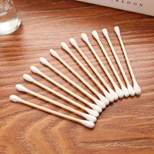 Disposable double-headed cotton swabs with wooden sticks for daily makeup and ear cleaning.