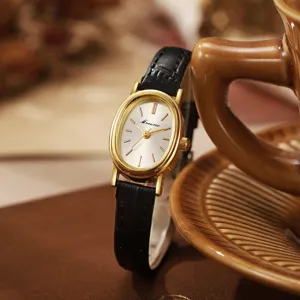 Elegante ovale Quartzuhr für Damen mit schwarzem Lederarmband und goldenem Gehäuse
