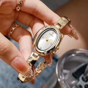 Elegante reloj de pulsera dorado para mujer con esfera ovalada con diamantes y estilo vintage
