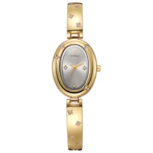Elegante reloj de pulsera dorado para mujer con estrellas de strass y esfera ovalada