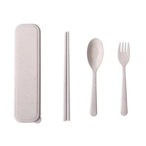 Set di posate portabile in paglia di grano con bacchette cucchiaio forchetta e astuccio.