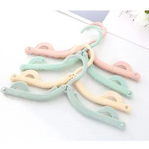 Portable folding clothes hanger travel space saving plastic mini drying rack multi color