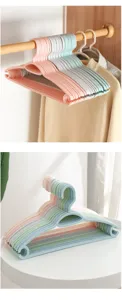 Plastic clothes hangers non-slip seamless coat hangers for home wardrobe clothes storage use.