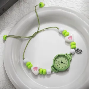 Reloj de cuarzo verde con cuentas de corazón y correa de cuerda trenzada para mujeres