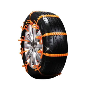 Universal orange plastic car snow tire anti-slip chains, cable tie design for easy winter driving.