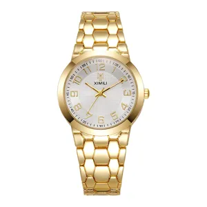 Orologio al quarzo da donna color oro con quadrante numerico e cinturino a nido
