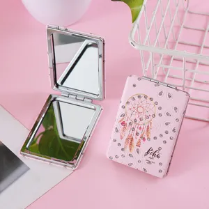 Portable double-sided PU folding makeup mirror with rhinestone dreamcatcher boho style design.