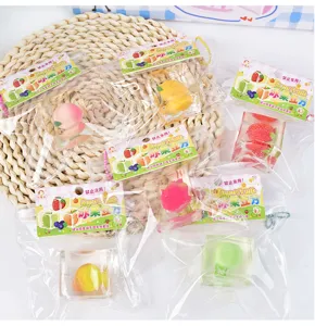 Cute fruit ice cube squishy toy set, soft stress relief toy for kids and adults, fun tactile play.