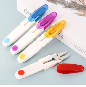 Colorful U-shaped embroidery thread scissors with clear protective caps for sewing craft.