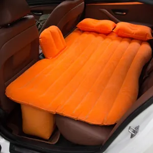 Orange inflatable car air mattress detail, comfortable sleeping pad for rear seat travel.