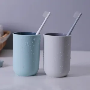 Minimalist plastic toothbrush cups set for couples, simple bathroom washing water mugs.