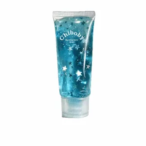 Portable blue glitter stress relief toy squeeze tube with star sequins for relaxation.